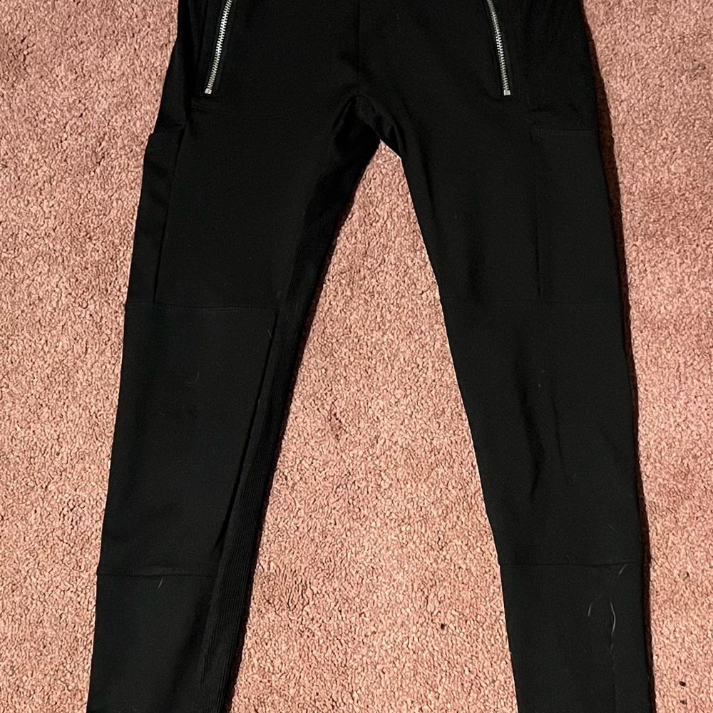 Sleek Black Leggings with Silver Zipper Accents